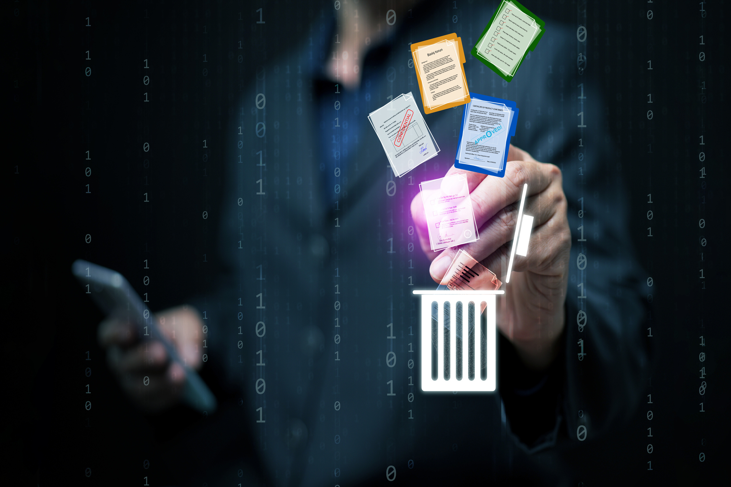 Ikonka kosza i plików, które do niego wpadają na ciemnym tle.