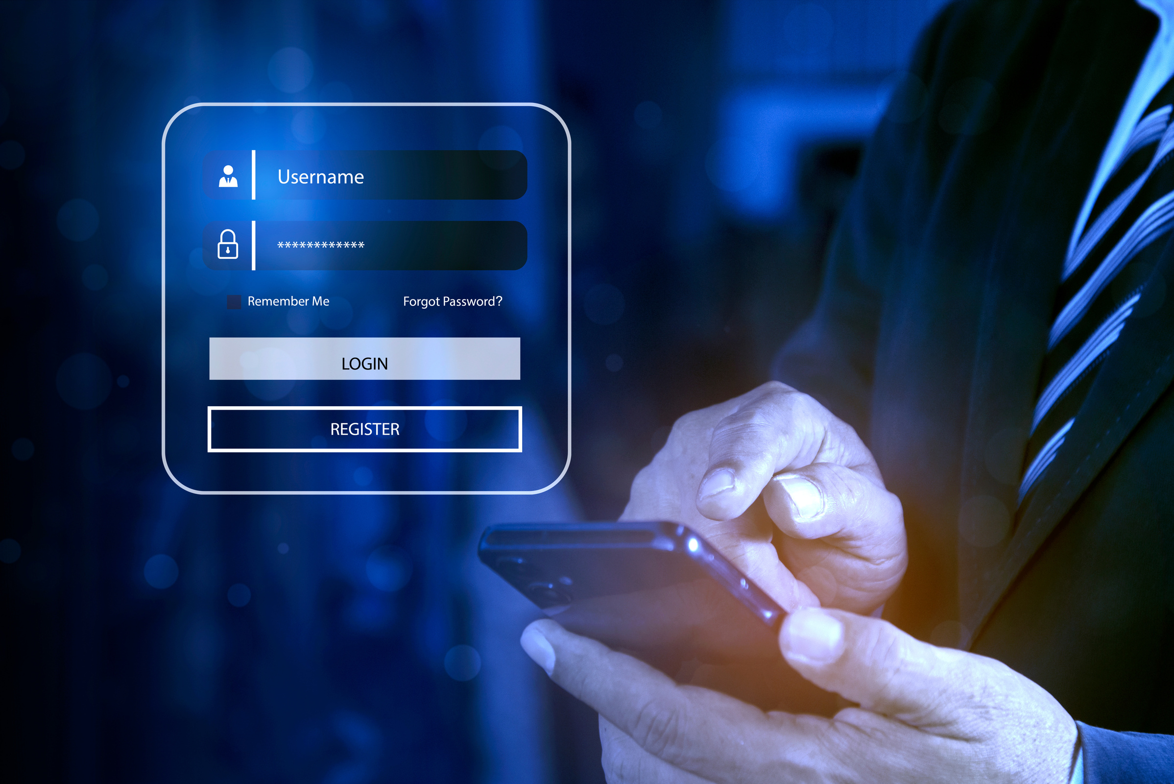Mężczyzna w garniturze trzyma w ręku smartfon, logując się do aplikacji mObywatel